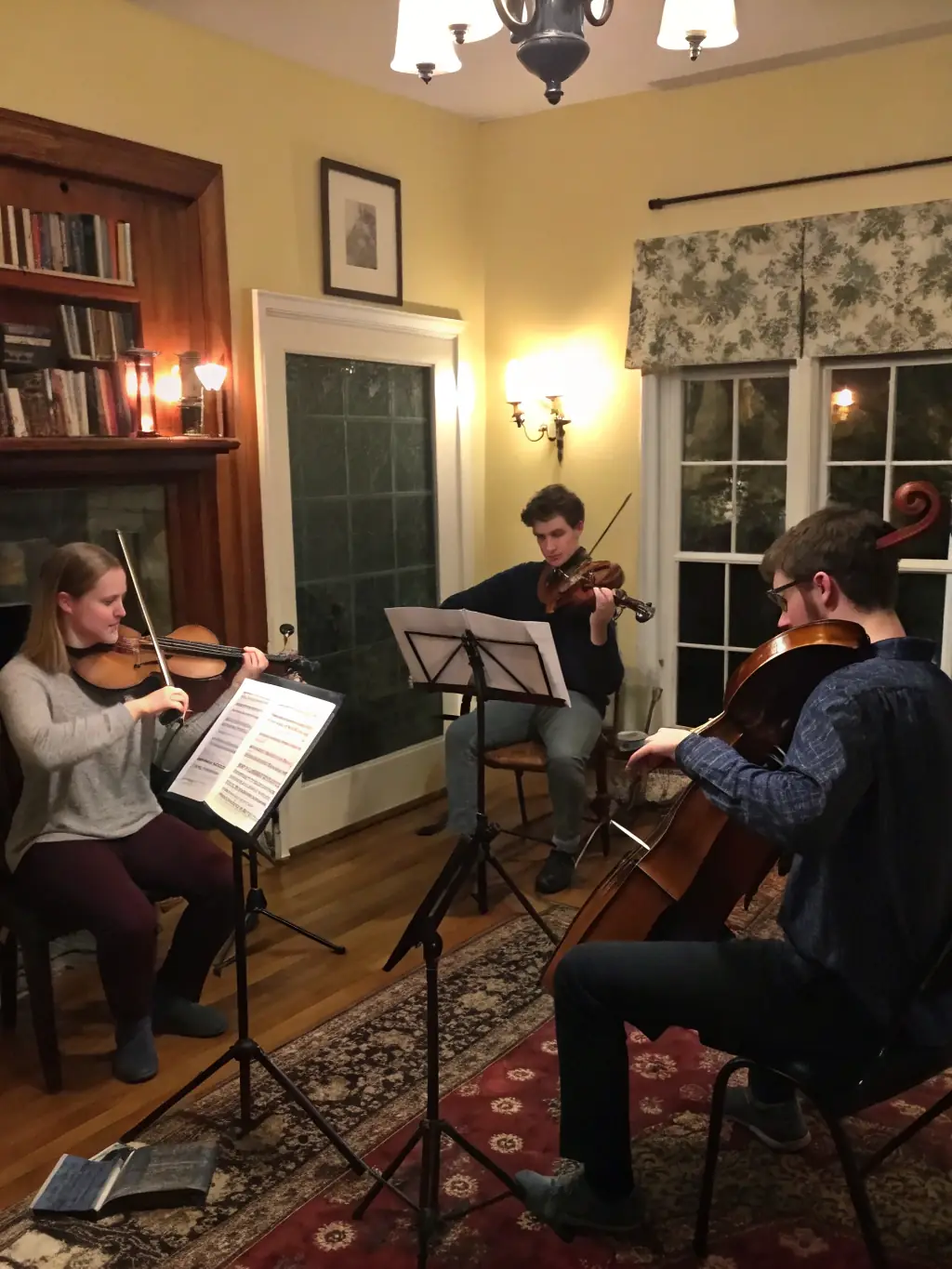 A photograph capturing a string quartet performing in a local community center, showcasing the intimate and engaging nature of the performance.